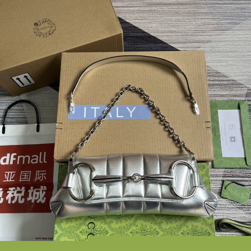 G*u*i horsebit bags